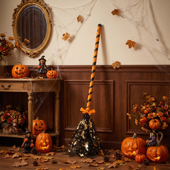 Halloween broom decoration with orange-and-black striped handle and black starry bristles