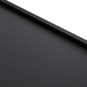 Black mirror frame close-up showing smooth matte finish