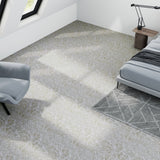 Peel-and-stick PVC floor tiles in light gray marble-effect finish