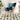 Upholstered rocking lounge chair, gray high back with teal, black, and white patchwork