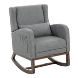 Grey upholstered rocking chair with cushioned armrest and front storage pocket