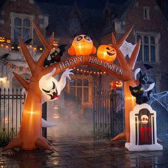 Halloween yard inflatable arch with owl and pumpkin banner, ghost, cats, and tombstone