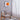 Adjustable arch LED floor lamp with orange dome shade and round marble base