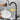 Black pull-down kitchen faucet with 360-degree swivel and handheld sprayer
