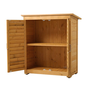 Outdoor wooden storage shed interior with open doors and two internal shelves