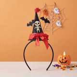 Black Halloween witch headband with skull graphic, red bow, and bat details