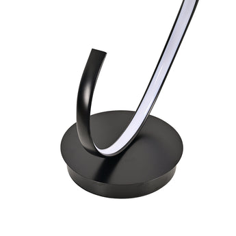 Black circular base with glowing white LED spiral tube
