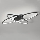 Black LED ceiling light with interlocking rings in bright white mode