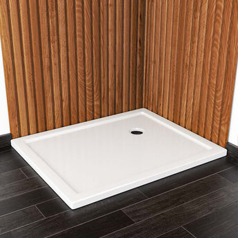 White rectangular wetroom tray with circular drain hole, low border