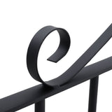 Close-up of black arched metal gate bar and vertical frame