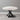 Black criss-cross coffee table legs under a small round tabletop, replacement base