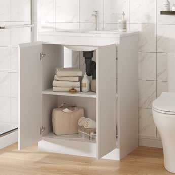 White bathroom vanity cabinet with open doors and adjustable inner shelves for storage