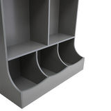 Grey close-up of curved lower bins in open toy storage cabinet with open side bays