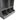 Grey close-up of curved lower bins in open toy storage cabinet with open side bays