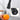 Black pull-down spray faucet head with water outlet detail