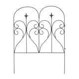 Metal garden fence panel with arched frame, scroll curls, and central spear finials, dark
