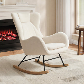 Cream lambswool rocking chair with high back, padded seat, black frame, wood runners.