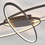 Black LED ceiling light close-up: interlocking ring frame with backplate