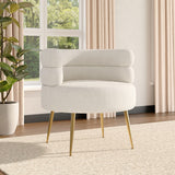 Cream teddy accent chair with rounded arms and gold legs, angled view