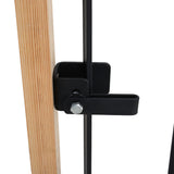 Black gate latch handle with mounting hardware on wooden post
