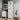 White tall cabinet with blind door open, showing shelves for bathroom toiletries