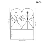 Metal garden fence panel with arched top scrollwork and spear finials, dark finish