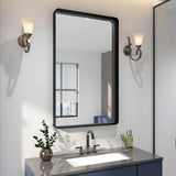 Rectangular wall mirror with dark metal frame and smooth glass, front view