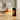 Black PTC electric heater with LED temperature display, standing on a floor base