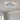 Chrome square LED flush mount with faceted crystal inner rings on the ceiling