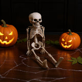 Hanging skeleton decoration with exposed ribcage and skull head, Halloween theme