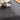 Stone-effect PVC click-lock flooring tiles, dark gray stone-look pattern in living room
