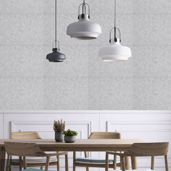 Silvery grey acoustic wall tiles with visible seams for home studio sound control