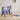 Blue toddler swing and slide set with basketball hoop and orange ball on floor