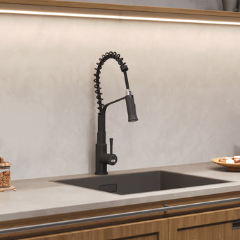 Black kitchen sink faucet with pull-down sprayer and side controls