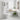 White bathroom over-toilet storage cabinet with open shelves and top door