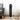 White digital ceramic tower heater with black control panel and display, standing base