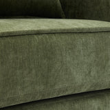 Close-up of green chenille upholstery fabric on the armchair seat