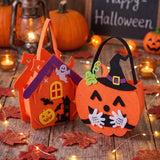 Halloween felt treat bags with haunted house and jack-o'-lantern faces