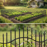 Black metal garden fence panels forming a low border around a planting bed