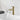 Brushed gold bathroom mixer tap with lever handle and curved spout, water stream