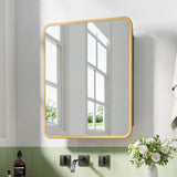 Angled view of gold-tone framed rectangular bathroom mirror cabinet with rounded corners