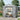 Metal garden storage shed with apex roof, double doors open, vent panels and interior shelving