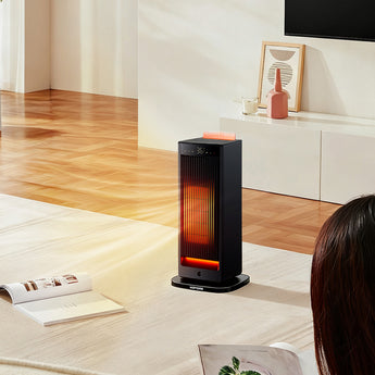 Compact black PTC space heater with glowing heating element and top LED panel