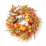 Halloween wreath with pumpkins, sunflowers, and curled ribbon accents