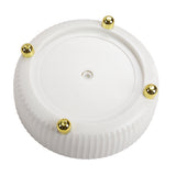 Bottom of rotating spice tray with central hole and gold feet