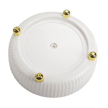 Bottom of rotating spice tray with central hole and gold feet
