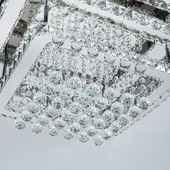 Crystal ceiling lamp detail: faceted prisms and clear round crystal drops