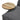 Round wooden tray table on grey upholstered chaise seat