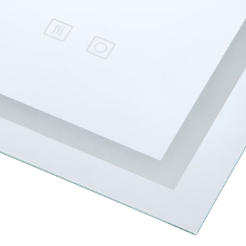 Wall-mounted LED bathroom mirror close-up of corner edge and touch control icons