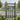 Wooden pedestrian gate with diamond lattice top and vertical slats, grey-stained finish